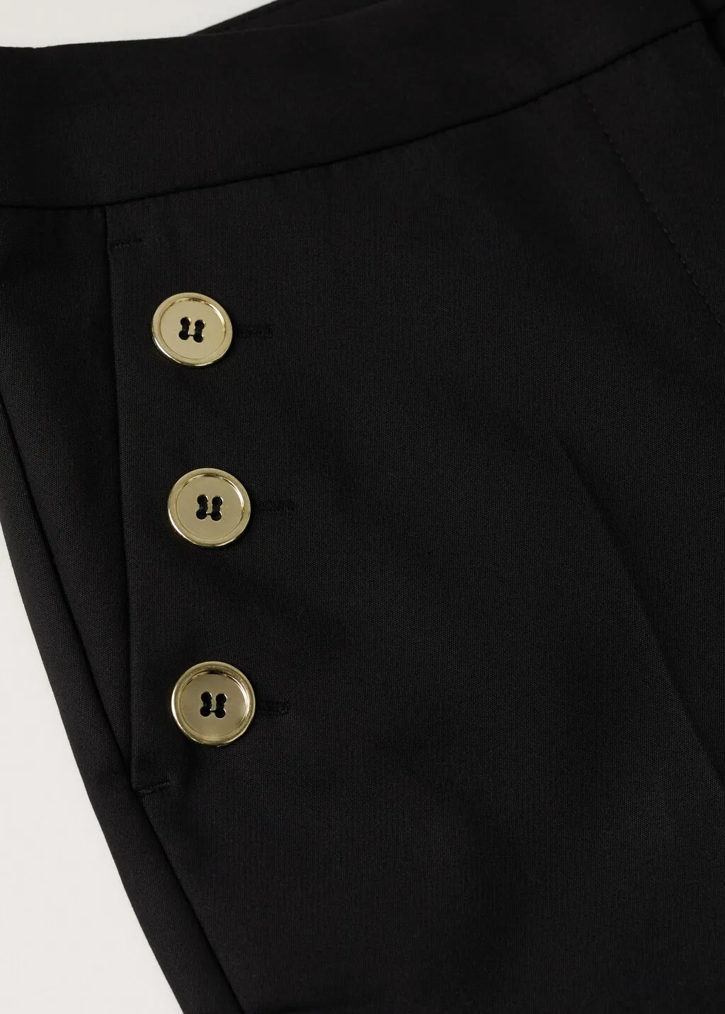 Pantaloni crop bottoni