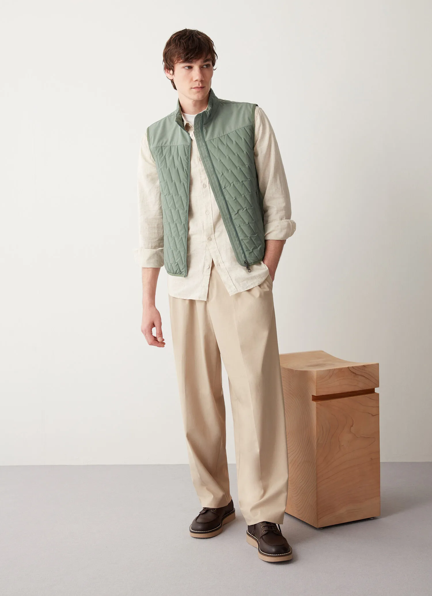 Quilted gilet with softshell inserts