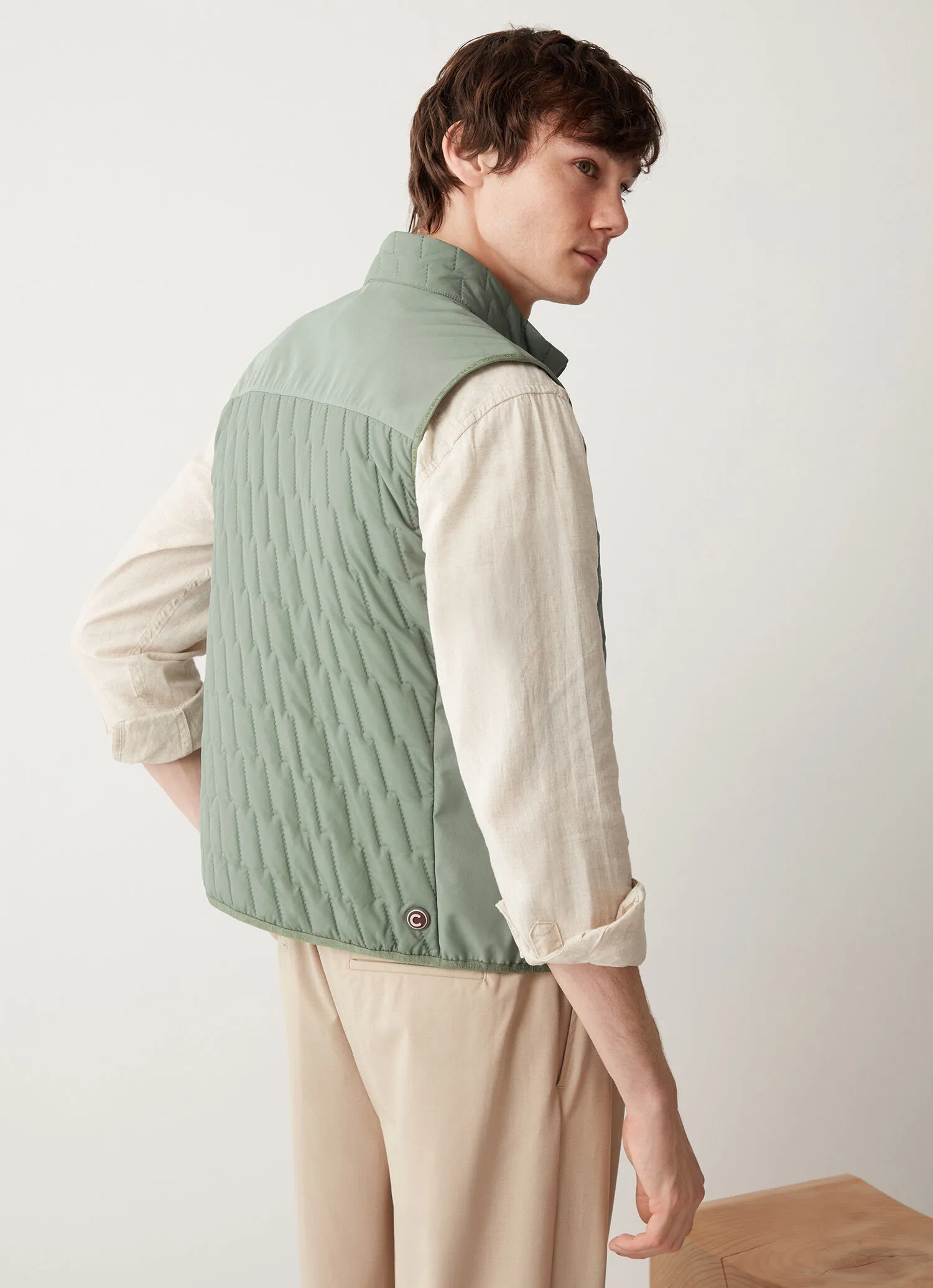 Quilted gilet with softshell inserts